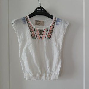 White sequined shirt